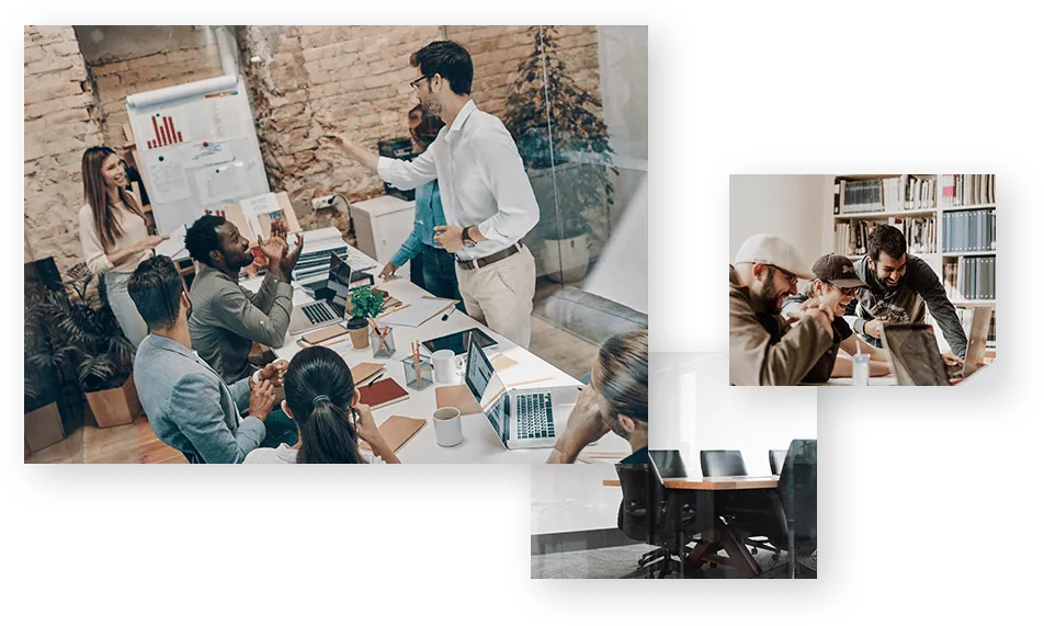Business team collaborating around a table with laptops during a strategy meeting